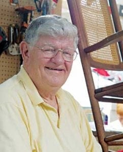 Men laying new hardwood flooring