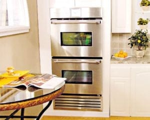 Men laying new hardwood flooring