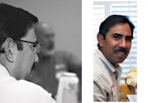 Men laying new hardwood flooring