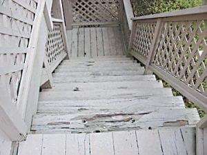 Men laying new hardwood flooring