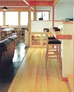 Men laying new hardwood flooring
