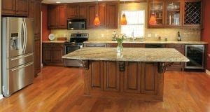 Men laying new hardwood flooring