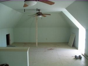 Men laying new hardwood flooring
