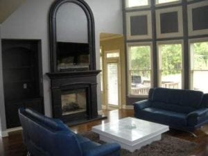 Men laying new hardwood flooring