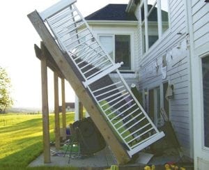 Men laying new hardwood flooring