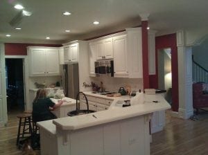 Men laying new hardwood flooring