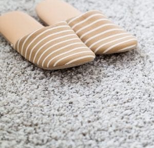 slippers on carpet flooring