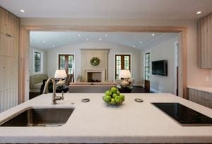 White kitchen with recessed lighting