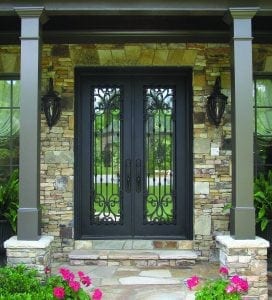 Custom-made wrought iron front door with sidelites