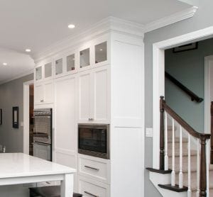 White kitchen with crown molding