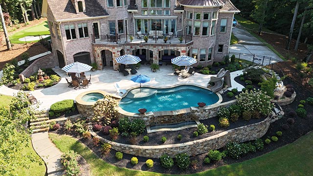 Gorgeous backyard with pool, spa and retaining walls