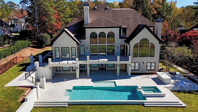 Decks overlooking modern design pool